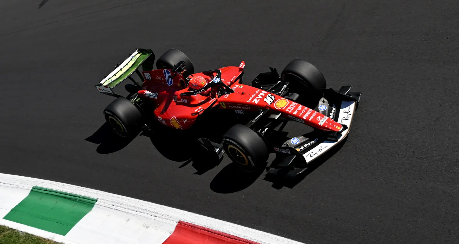 MONZA, ITALY - SEPTEMBER 03: Lewis Hamilton of Great Britain and Scuderia Ferrari speaks in the