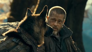 HEART OF THE BEAST, from left: Uber the dog as Odin, Brad Pitt, 2026. © Paramount Pictures / Courtesy Everett Collection
