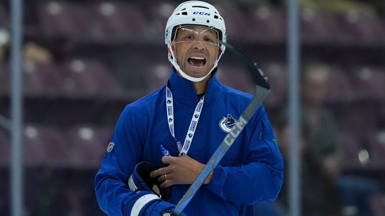 Canucks' Malhotra leads by example at energizing camp
