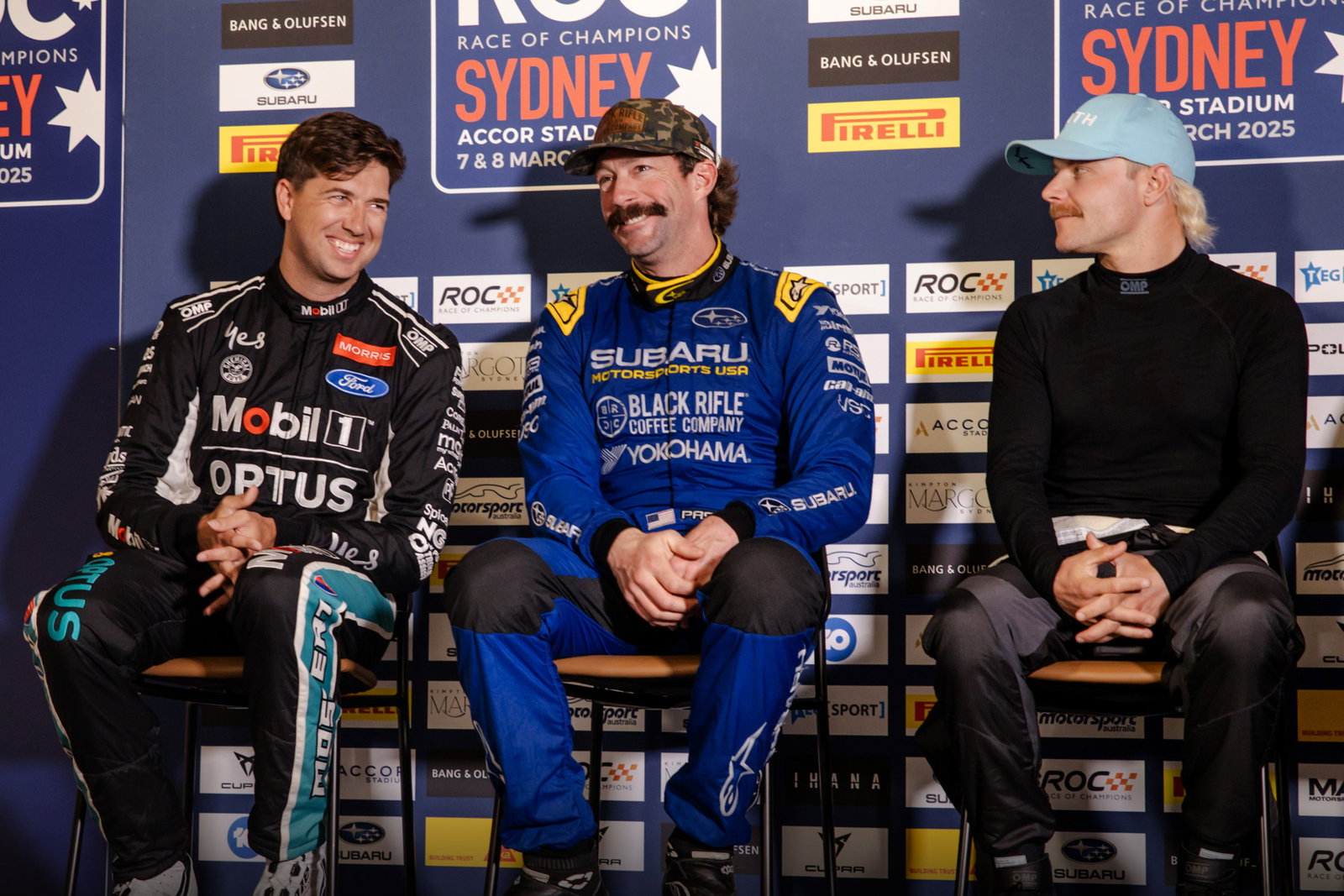 Chaz Mostert with Travis Pastrana (middle) and Valtteri Bottas (right).