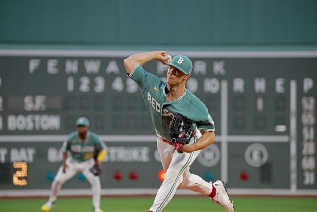 Boston Red Sox pitcher Sonny Gray (54) throws in the first as the Red Sox take on the Giants. Stuart Cahill/Boston Herald