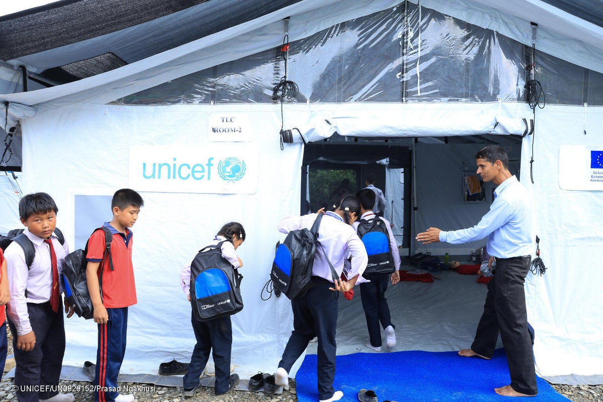 Children return to learning in temporary learning centres set up with UNICEF support after devastating floods damaged classrooms and disrupted education in affected communities. 