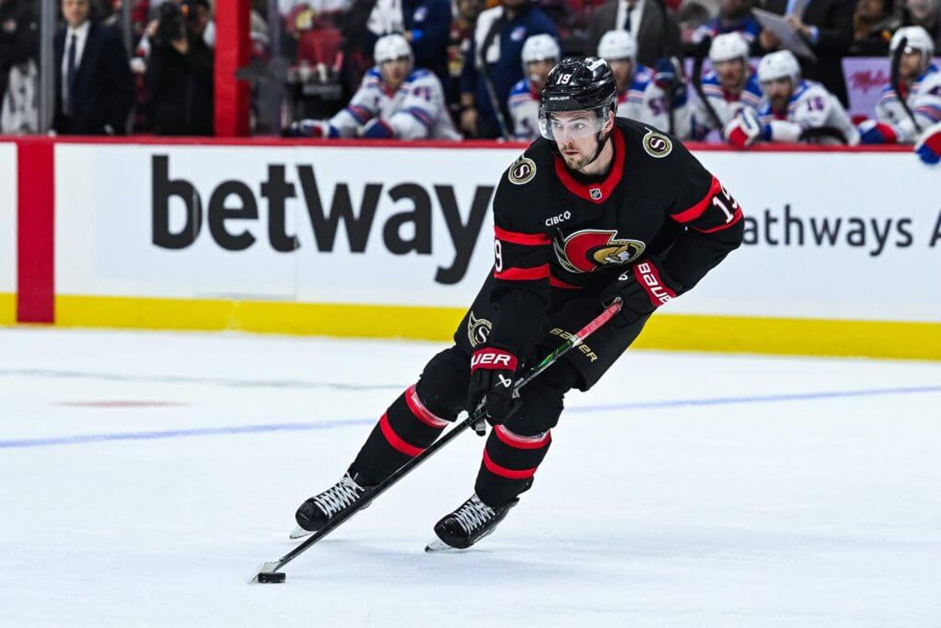 Drake Batherson plays the puck during a December 2025 game with the Ottawa Senators.