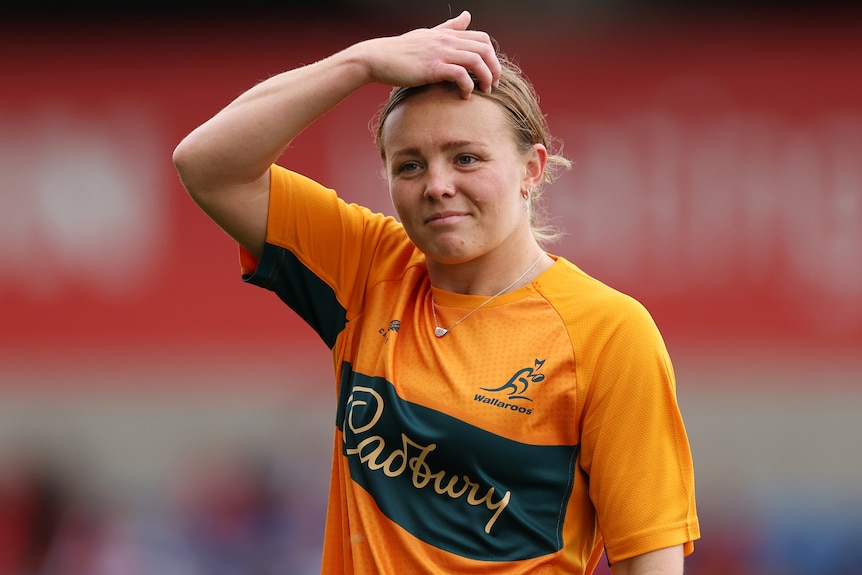 Piper Flynn warms up for the Wallaroos before a Test in 2026.