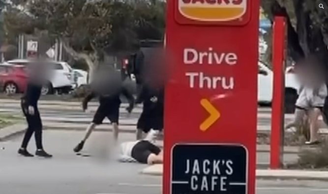 The man is seen on the ground after the alleged assault by a group of people in Mandurah.
