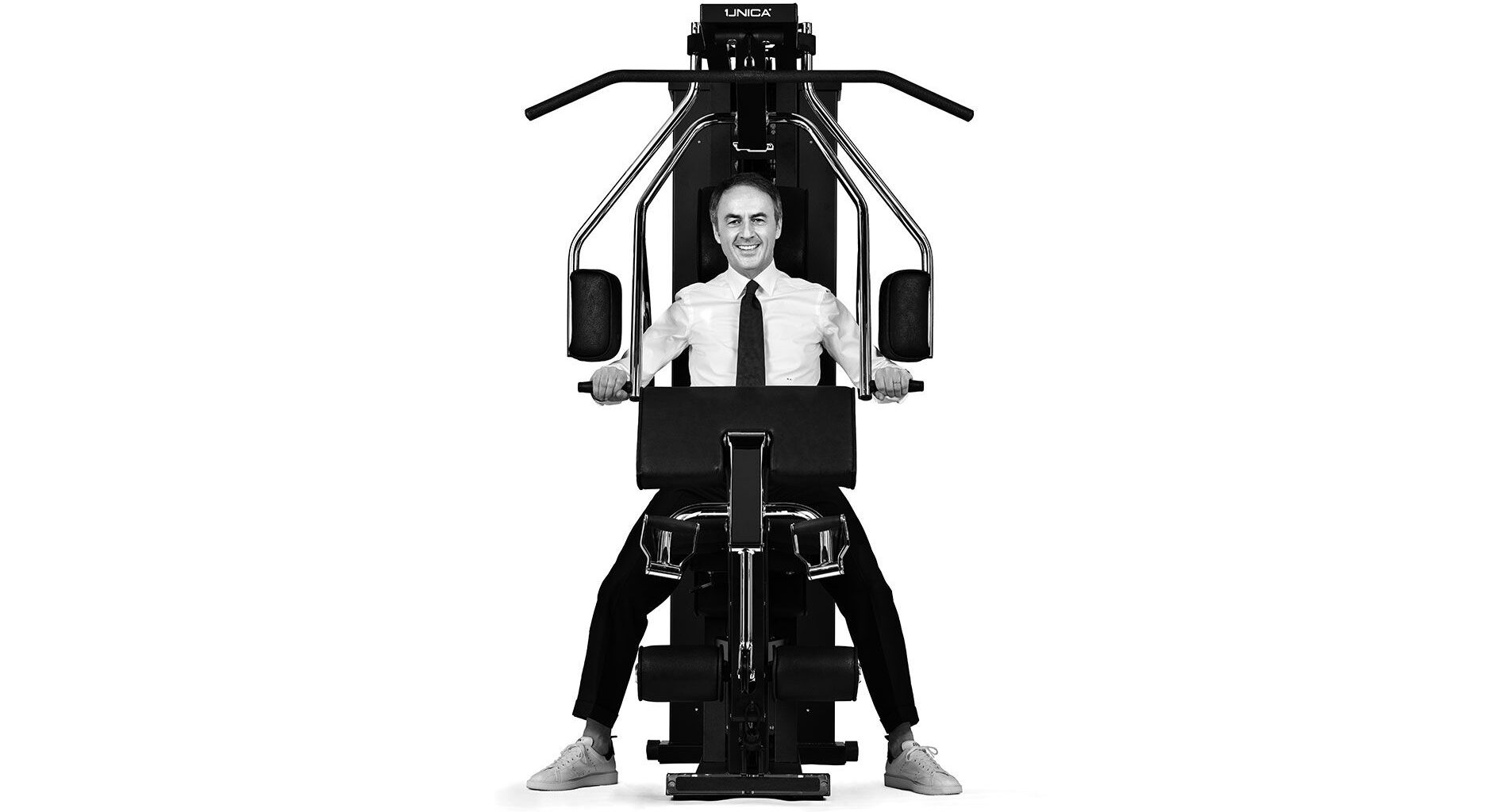 Technogym founder Nerio Alessandri on a Unica exercise machine