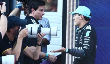 Toto Wolff in conversation with George Russell in the paddock