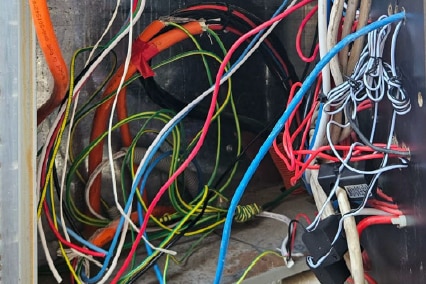 Messy electrical wiring in a box