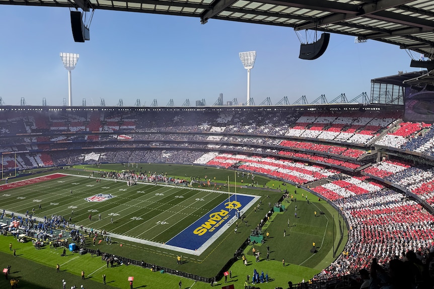 The Australian and US flag in the stands at the NFL MCG clash.