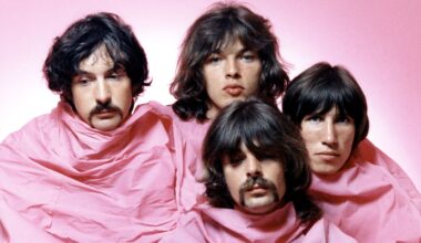 Pink Floyd pose shrouded in pink in August of 1968 in Los Angeles. (L-R) Nick Mason, Dave Gilmour, Rick Wright (center front), Roger Waters. (Photo by Michael Ochs Archives/Getty Images)
