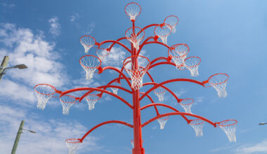 alexandre arrechea grows a playable tree of basketball hoops in toronto