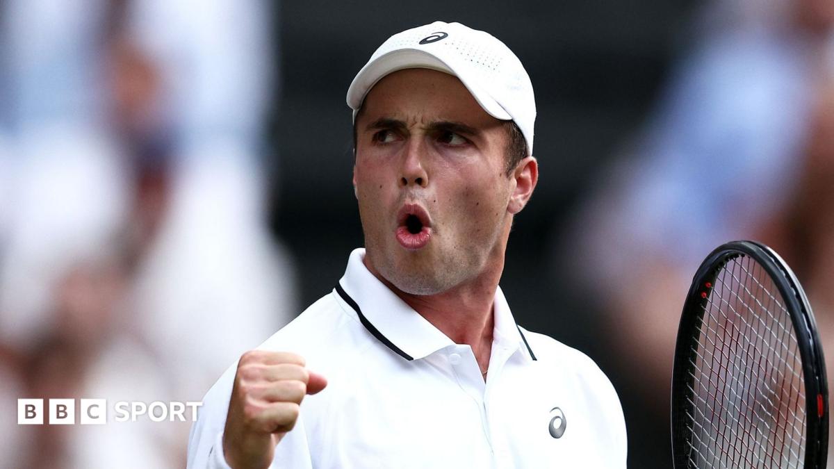 Arthur Fery reacts to winning a point at Wimbledon