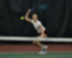 Juneau-Douglas High School: Yadaa.at Kalé senior Aurora Madsen follows through after hitting a forehand shot during the Region V tennis championships at The Alaska Club in the Mendenhall Valley on Friday, Sept. 25, 2026. Madsen has played four seasons with the Crimson Bears. (Klas Stolpe / Juneau Independent)