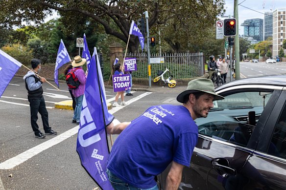 Staff at the University of Sydney set up picket lines on Wednesday, 