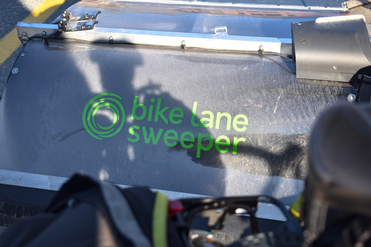 Whistler Cycling Club tests bike-towed sweeper on Highway 99