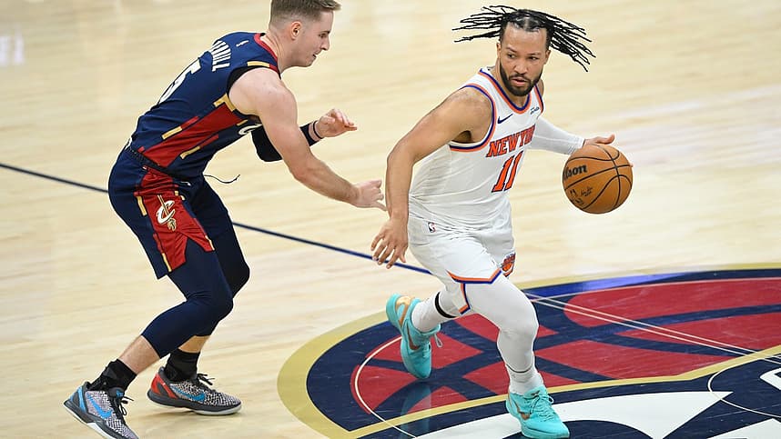 Knicks guard Jalen Brunson drives against Cleveland