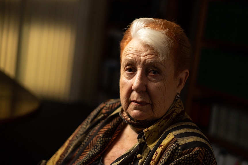 Frances Nelson looks at the camera.