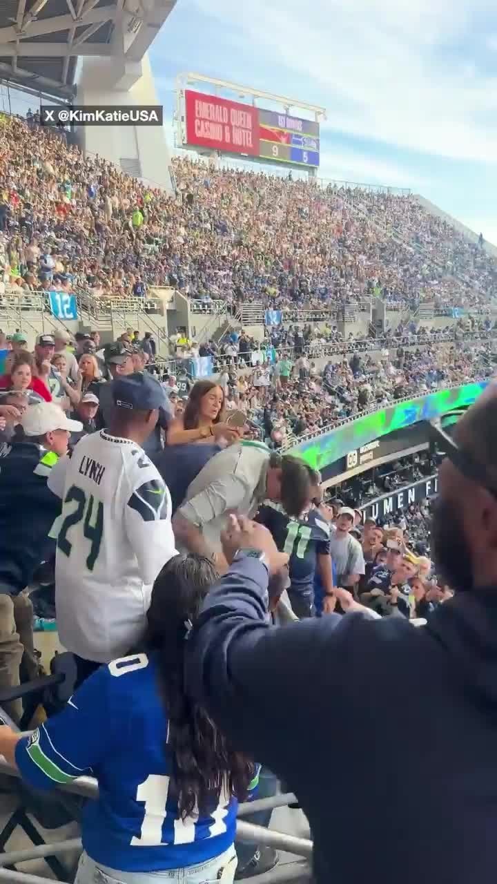 Patriots fan takes on multiple Seahawks fans