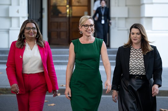Outgoing Greens leader Larissa Waters (centre) with colleagues Mehreen Faruqi (left) and Sarah Hanson-Young.