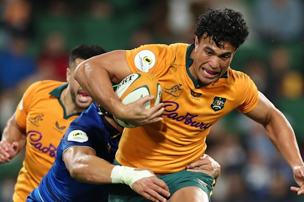 Joseph-Aukuso Suaalii runs the ball against Italy during the Nations Championship game at HBF Park in Perth.