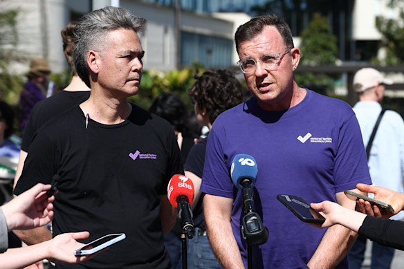 NTEU USYD branch president Peter Chen and NTEU NSW state secretary Vince Caughley speak during the rally.