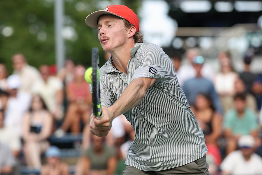 Dane Sweeny plays a double-fisted backhand at the US Open.