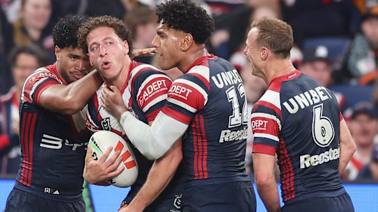 Mark Nawaqanitawase of the Roosters celebrates scoring a try during the round 25 NRL match between Sydney Roosters and Wests Tigers at Allianz Stadium