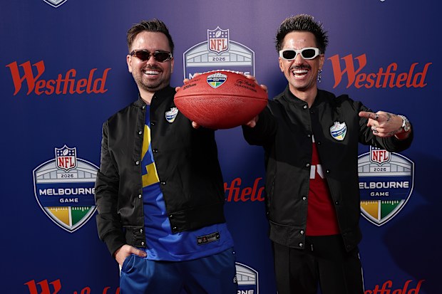 Luke Scott and Sassy Scott arrive at the MCG.