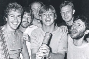 A black and photo of the Little River Band, with a young John Farnham at the front.