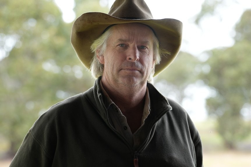 Peter Buckenara wears a brown hat and dark coloured jumper.