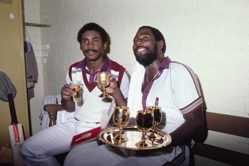 Gordon Greenidge and Viv Richards share a drink in the locker room