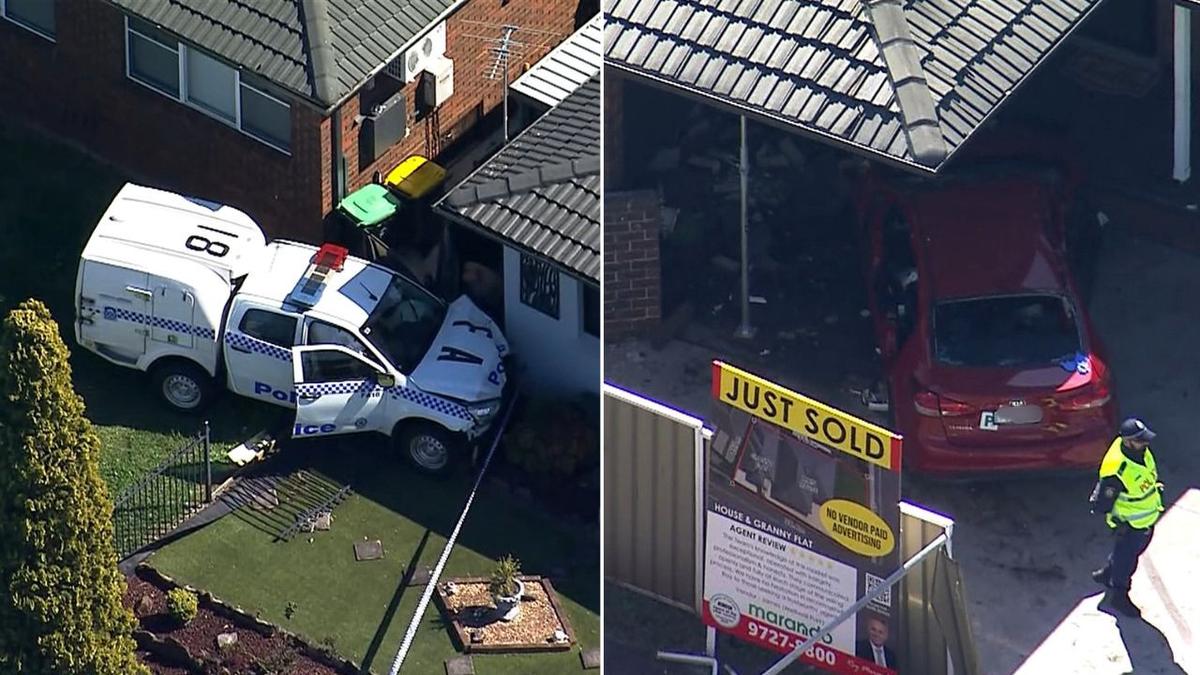 Two fighting for life, critical incident declared after police vehicle and sedan collide before crashing into Bossley Park homes