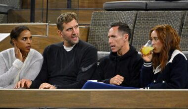 Former Dallas Mavericks teammates Dirk Nowitzki and Steve Nash talk while watching a tennis match from their seats.
