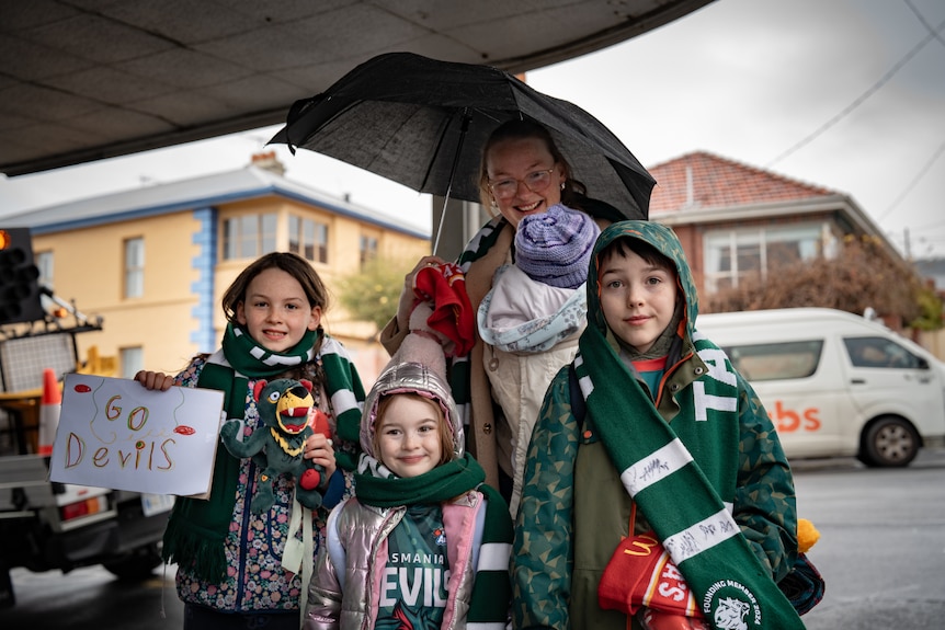 A family of Devils supporters.