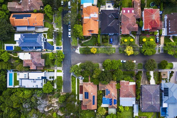 Aerial view of Suburban roof tops directly above