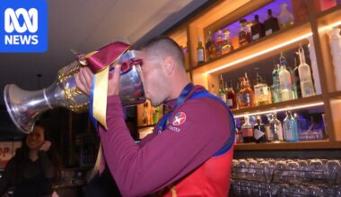 Brisbane Lions players celebrate AFL grand final win ahead of fan day in Fitzroy