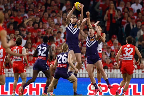 Cox hauls in a mark against the Swans.