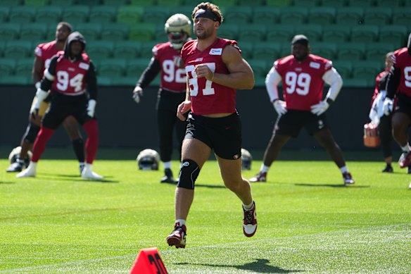 San Francisco 49ers defensive lineman Nick Bosa runs on Wednesday.