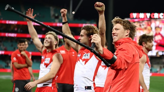 Callum Mills and his Swans after a win for the ages.