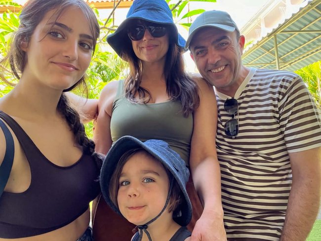 Andrei Mazandarani with his wife and two children.