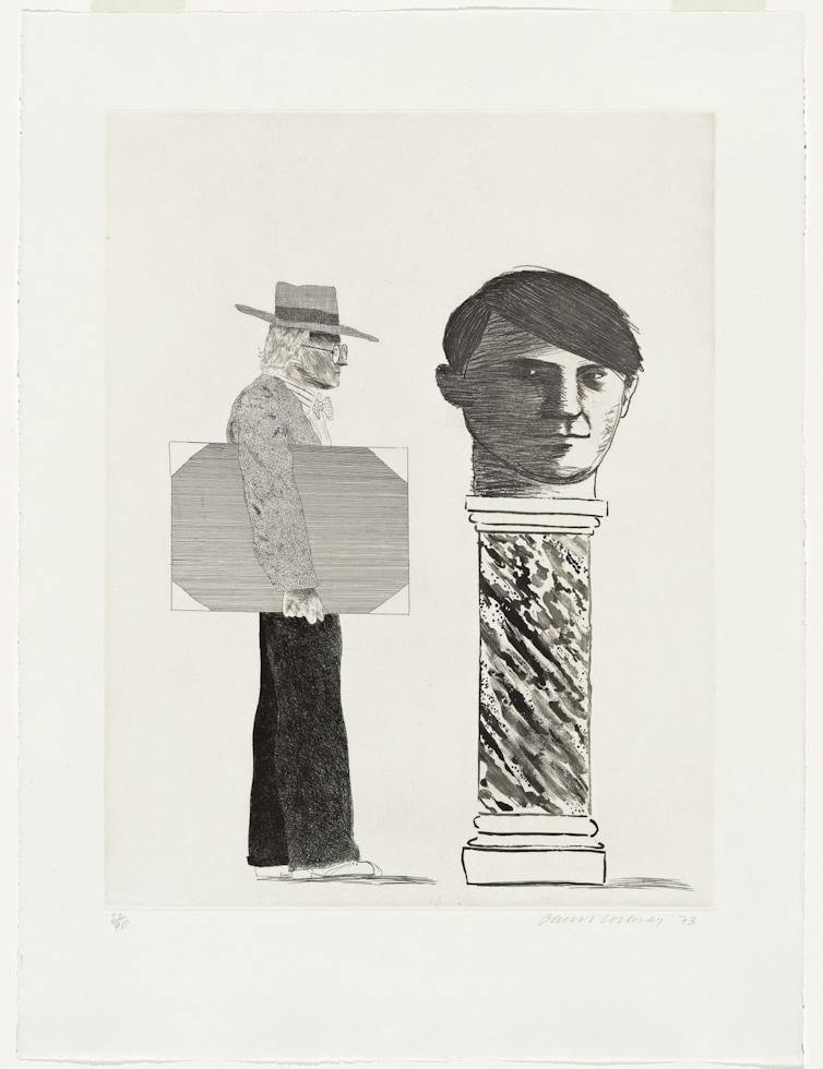 Framed image of a man in a hat standing next to a plinth bearing another man's oversized head.