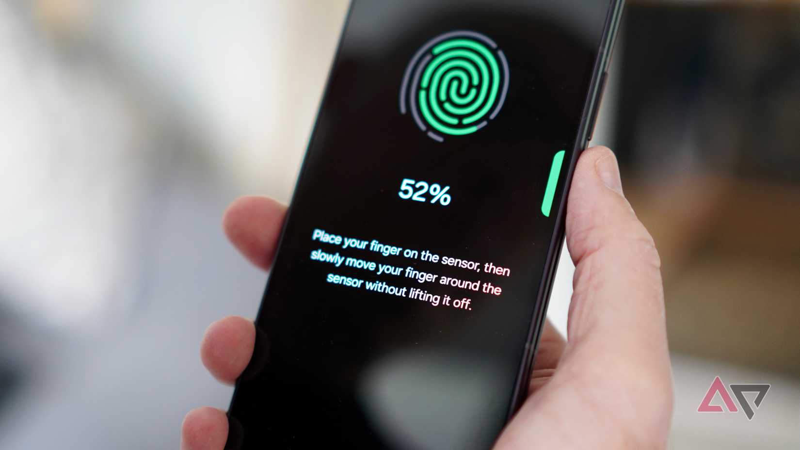 A person using the fingerprint sensor on the Samsung Galaxy Z Fold 8 Ultra