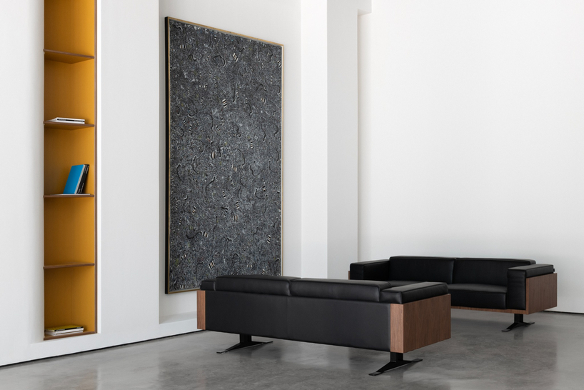 dubai gallery pairs open white exhibition halls with a concealed, brick-toned museum room - 4