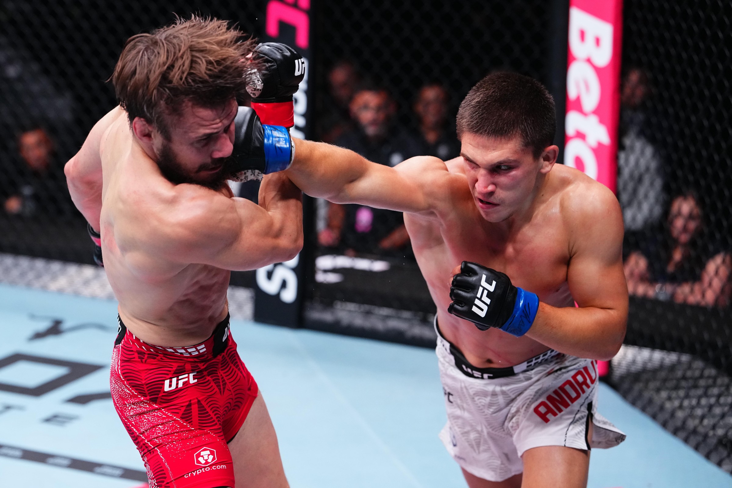 PARIS, FRANCE - SEPTEMBER 05: Pavel Andrusca of Moldova punches Nathaniel Wood of England in their featherweight fight during the UFC Fight Night event at The Accor Arena on September 05, 2026 in Paris, France. (Photo by Jeff Bottari/Zuffa LLC)