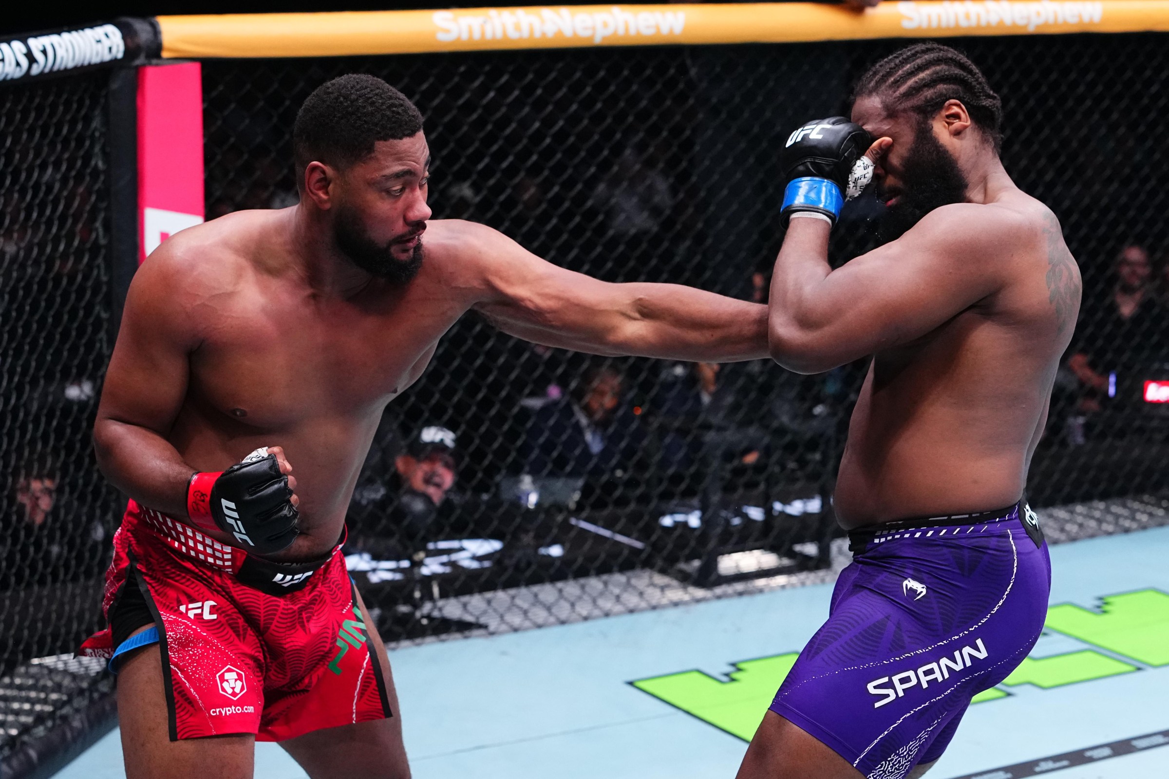 PARIS, FRANCE - SEPTEMBER 05: (L-R) Mario Pinto of Portugal punches Ryan Spann in their heavyweight fight during the UFC Fight Night event at The Accor Arena on September 05, 2026 in Paris, France. (Photo by Jeff Bottari/Zuffa LLC)