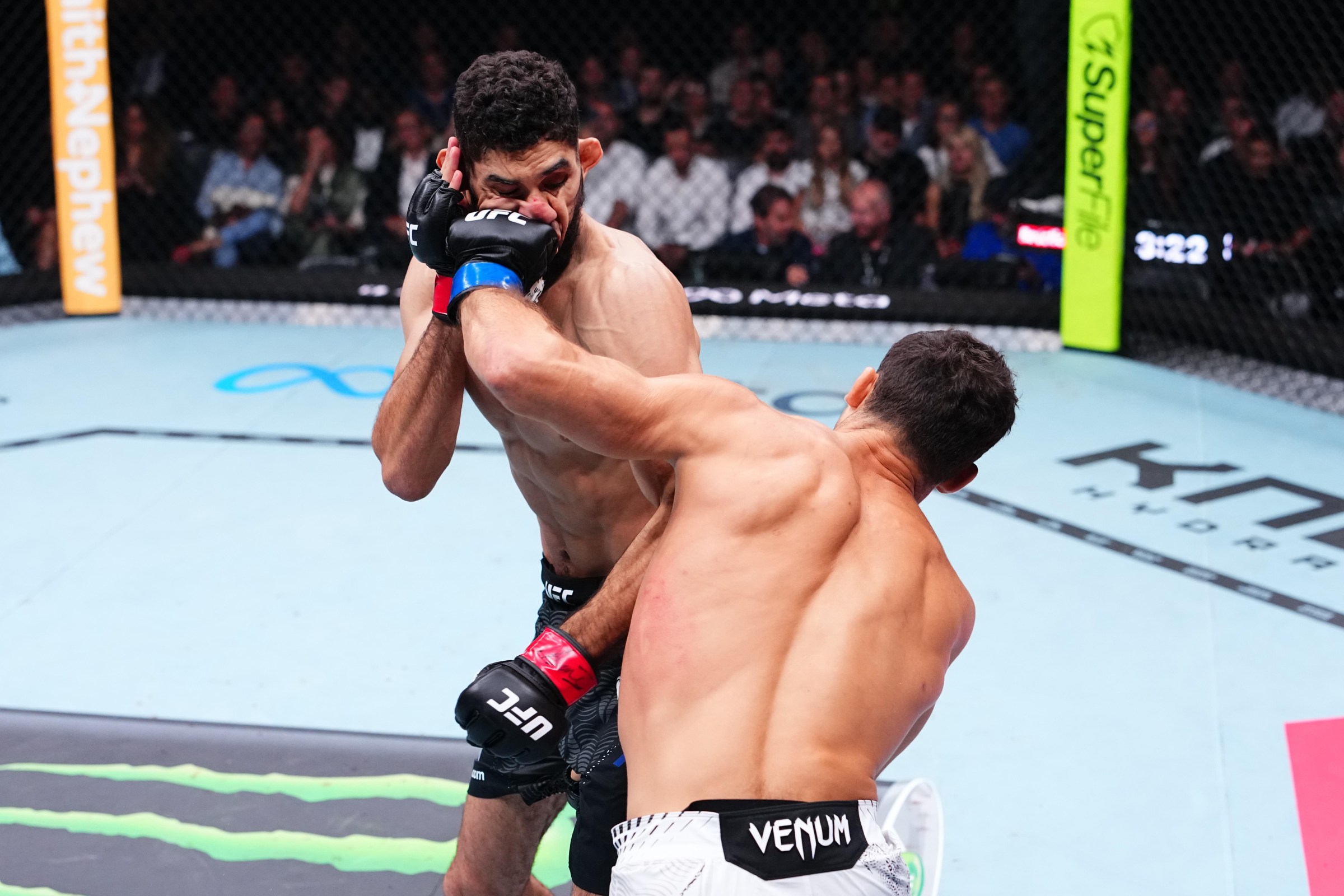 PARIS, FRANCE - SEPTEMBER 05: (R-L) Axel Sola of France punches Fares Ziam of France in their middleweight fight during the UFC Fight Night event at The Accor Arena on September 05, 2026 in Paris, France. (Photo by Jeff Bottari/Zuffa LLC)