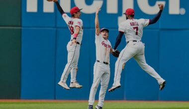 Cleveland Guardians left fielder Steven Kwan, left, center fielder Petey Halpin, center, and right fielder Jo Adell (7) celebrate after the Guardians defeated the Chicago White Sox in a baseball game in Cleveland, Wednesday, Sept. 16, 2026. (AP Photo/Sue Ogrocki)