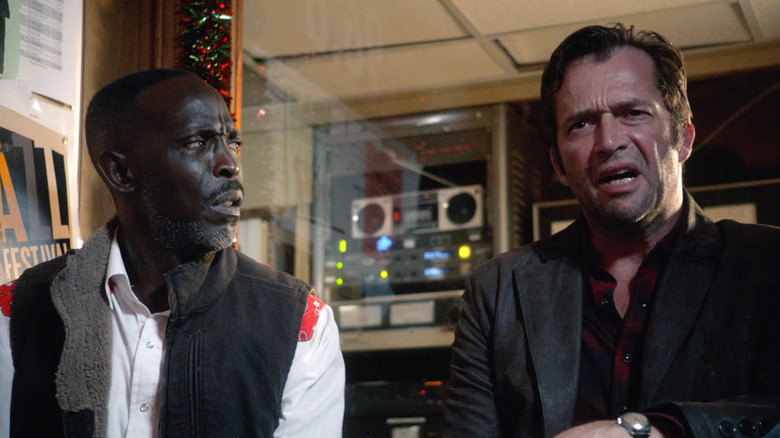 Leonard (Michael K. Williams) looking at a crying Hap (James Purefoy) on 