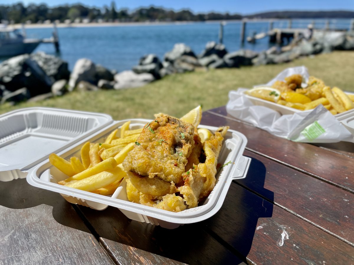 Takeaway fish and chips by the water.