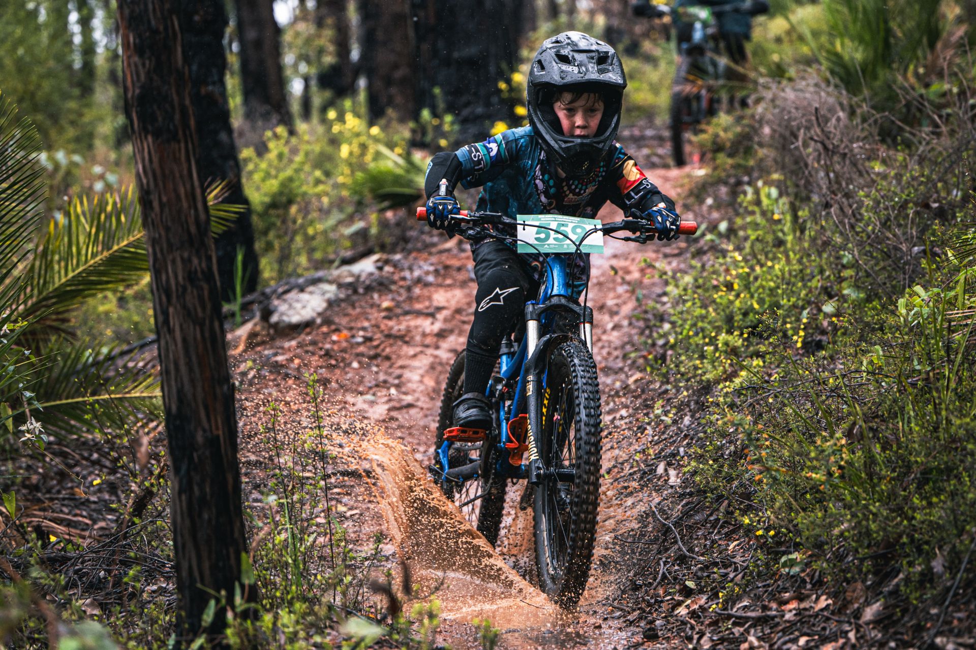 A young juniro rider at the AusCycling Enduro Mountain Bike National Championships